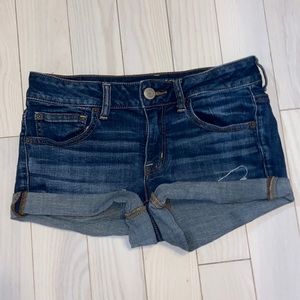 stretchy dark blue shorts